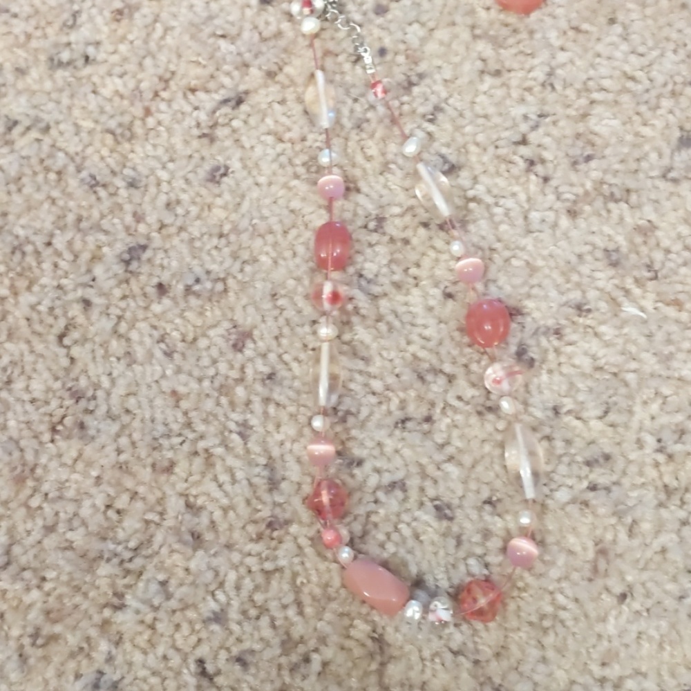 matching pink necklace and earrings